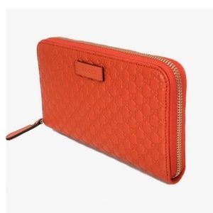 Orange Gucci Leather Zip Around Wallet $795